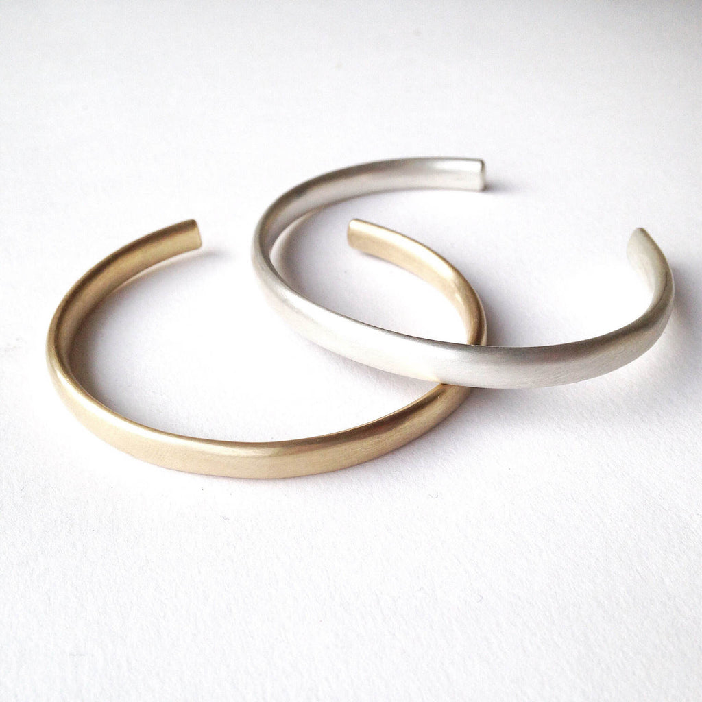 open back silver cuff with oval profile by Michele Wyckoff Smith