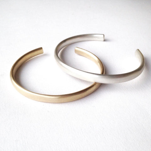 open back silver cuff with oval profile by Michele Wyckoff Smith