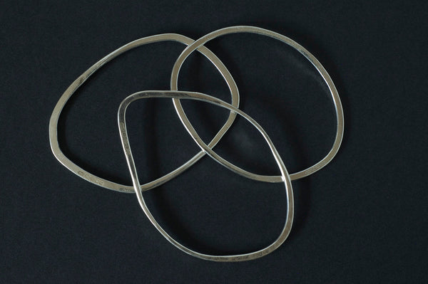 Trio of Oval Shaped Hammered Bangles
