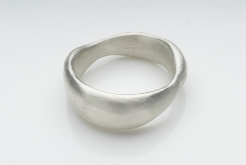 Organic shaped chunky wide wedding band.