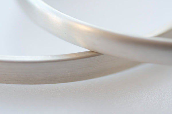 Rectangular or oval cuff showing two styles by Michele Wyckoff Smith