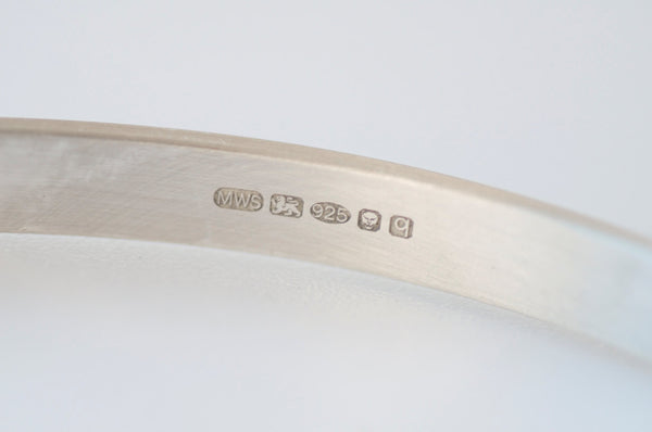 Traditional British hallmarks on silver cuffs by Michele Wyckoff Smith