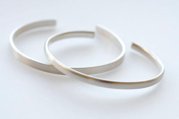 Rectangular or oval open back cuff bracelet by Michele Wyckoff Smith