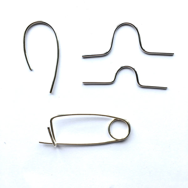 Assorted images of silver knitting notions by Michele Wyckoff Smith