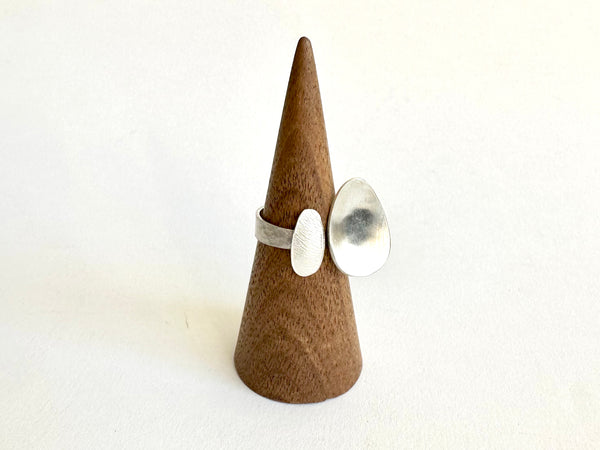 Textured open ring on wooden ring stand - www.wyckoffsmith.com