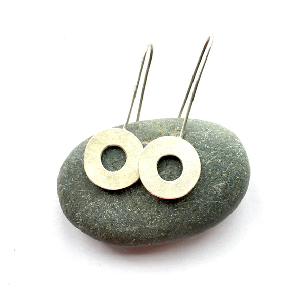 Matte textured silver circle earrings on www.wyckoffsmith.com