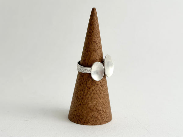 Side view of adjustable ring showing hammer punch textured ring shank - www.wyckoffsmith.com