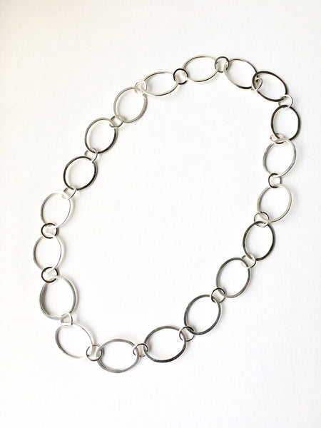 Hammered oval silver chain on www.wyckoffsmith.com.