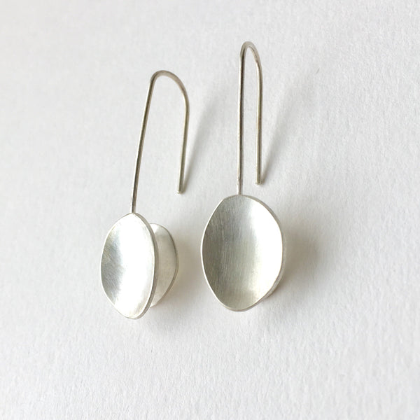 Silver oval organic shaped earrings by Michele Wyckoff Smith.