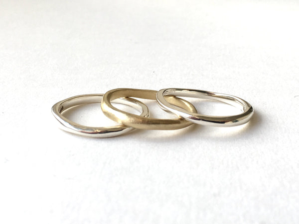 Organic shaped stacking wedding bands by Wyckoff Smith Jewellery