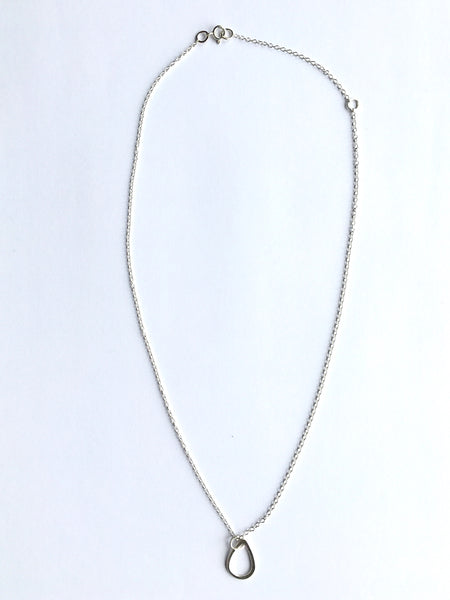 Overview photograph of silver teardrop shape pendant on adjustable 16" or 18"  silver chain. www.wyckoffsmith.com
