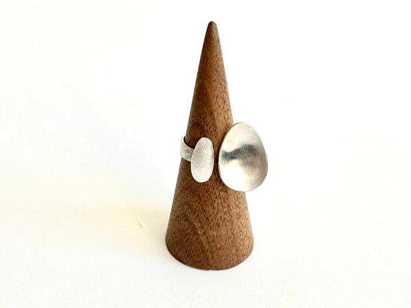 second photo of open ring with textured ovals on a textured ring shank - www.wyckoffsmith.com
