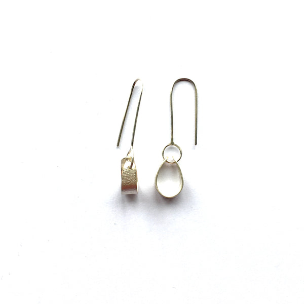 Side view and front view of Swing Petal Silver earrings on www.wyckoffsmith.com
