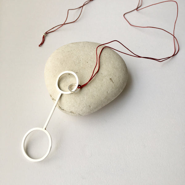Larger bubble wand silver pendant on red string - wyckoffsmith.com