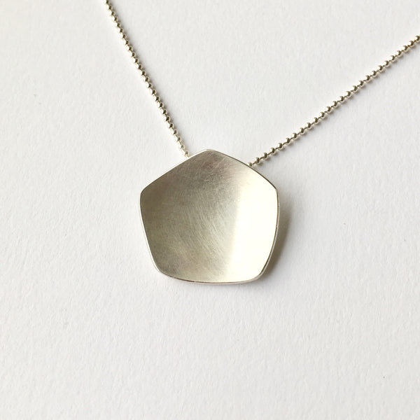 Solid Calyx shape pendant on adjustable 18" / 20" chain on www.wyckoffsmith.com