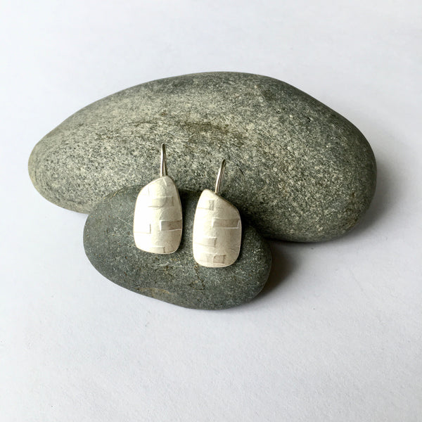 Textured silver spinnaker dangle earrings with sliding horizontal bar texture (optional 2) on www.wyckoffsmith.com