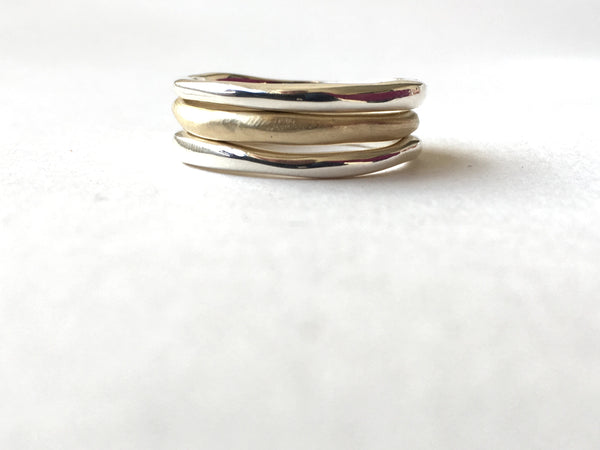 Organic shaped stacking rings in silver and gold by Michele Wyckoff Smith