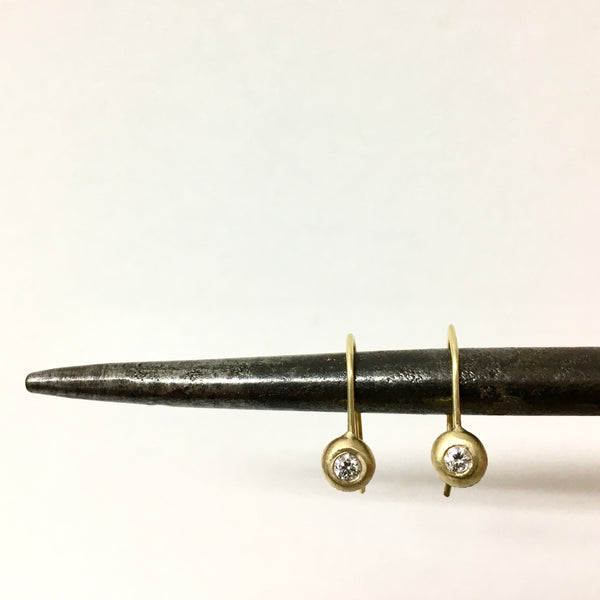 Diamond and 18 ct recycled gold earrings with hooks on  a steel bar - www.wyckoffsmith.com - Michele Wyckoff Smith