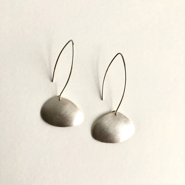 Flat lay view of cherrystone silver dangle earrings  by www.wyckoffsmith.com