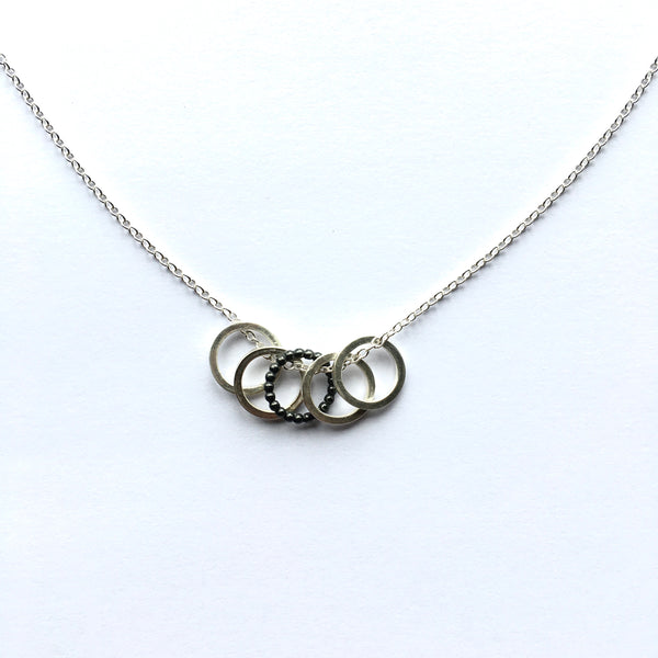 Silver stitch marker necklace by Michele Wyckoff Smith of Wyckoff Smith Jewellery