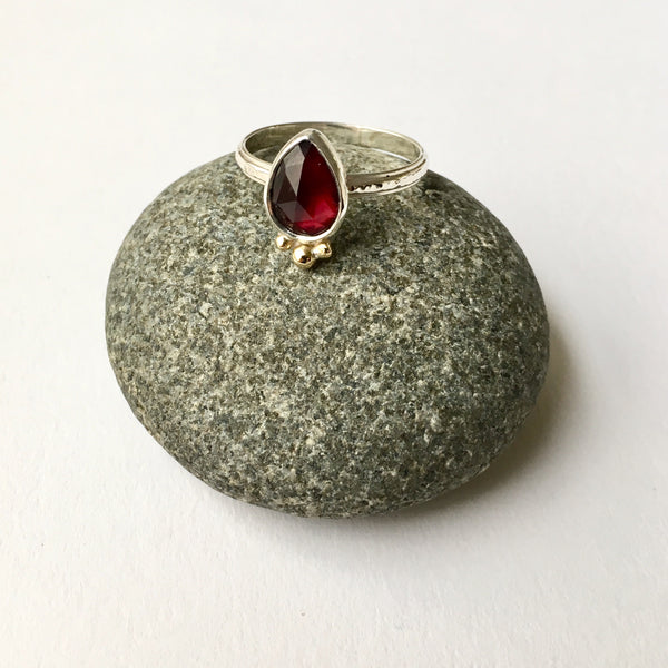 Garnet set in silver with 18 ct gold balls ring by Michele Wyckoff Smith