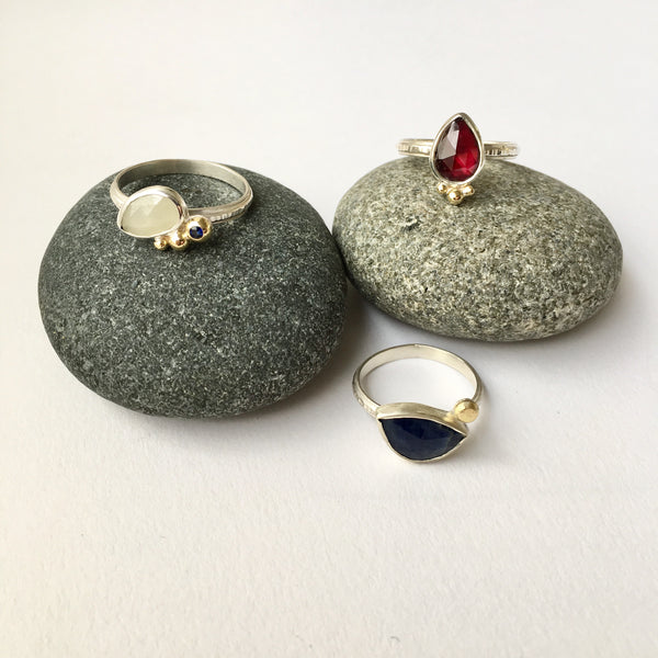 Sapphire and garnet rings by Michele Wyckoff Smith
