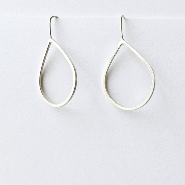 Wyckoff Smith Jewellery silver pear shaped earrings side view.