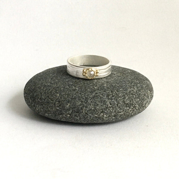 Front view of grey rose cut diamond set in 18 ct hammer bezel on silver band - www.wyckoffsmith.com