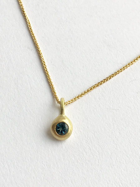 London Blue Topaz flush set into 18 ct gold by Wyckoff Smith Jewellery