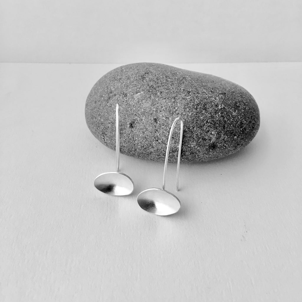 Horizontal oval dangle earrings