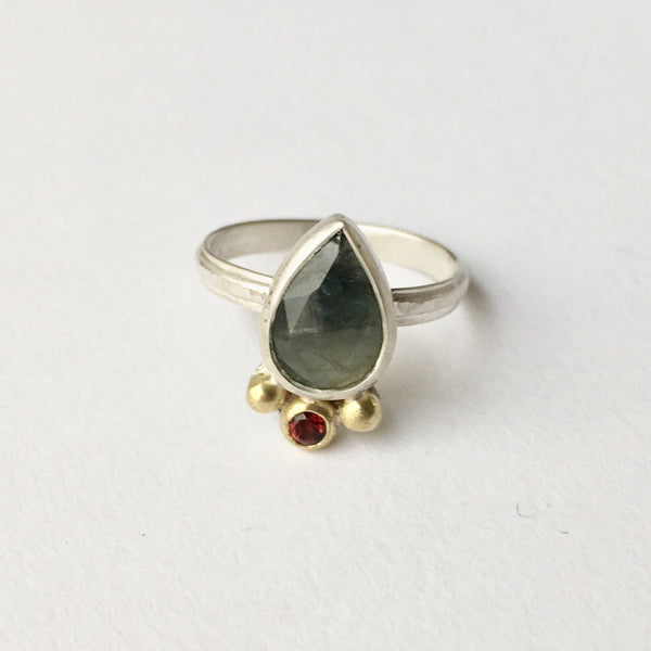 Two tone blue and green faceted sapphire with hammer textured ring shank by Michele Wyckoff Smith