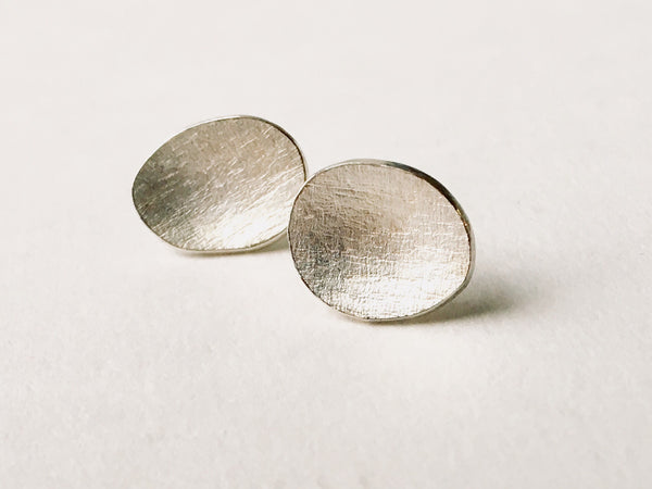 Oval textured silver earrings by Michele Wyckoff Smith