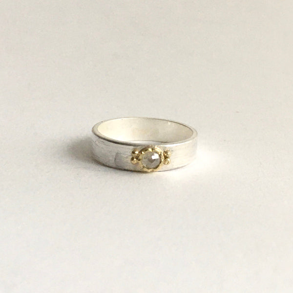 Front view of light grey rose cut diamond set in 18 ct gold on silver band - www.wyckoffsmith.com