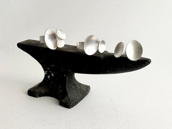 Assortment of three adjustable rings on a mini anvil - www.wyckoffsmith.com