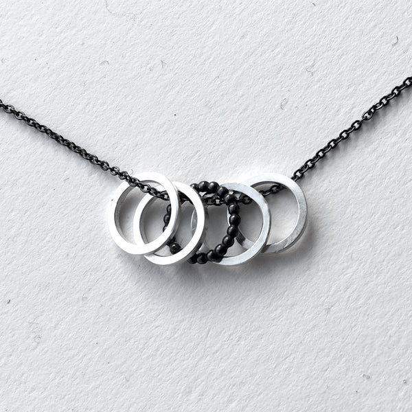 Five non snag silver stitch markers for knitting by Wyckoff Smith Jewellery  www.wyckoffsmith.com