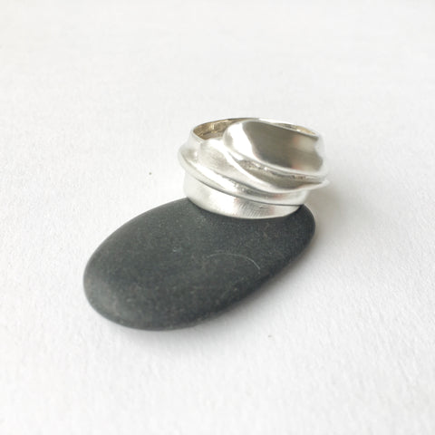Graceful cast silver wrap ring by Michele Wyckoff Smith.