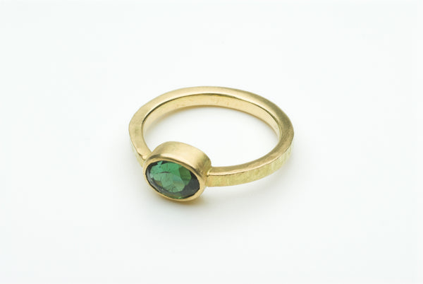 Green faceted tourmaline ring by Michele Wyckoff Smith.