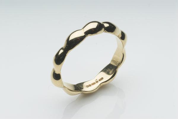 Gold Kelp Wedding Ring inspired by seaweed on the coast of New England. Available for purchase on www.wyckoffsmith.com