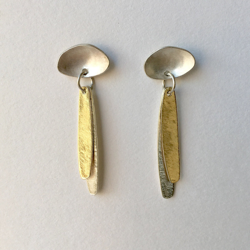Silver and gold vermeil petal stud earrings.