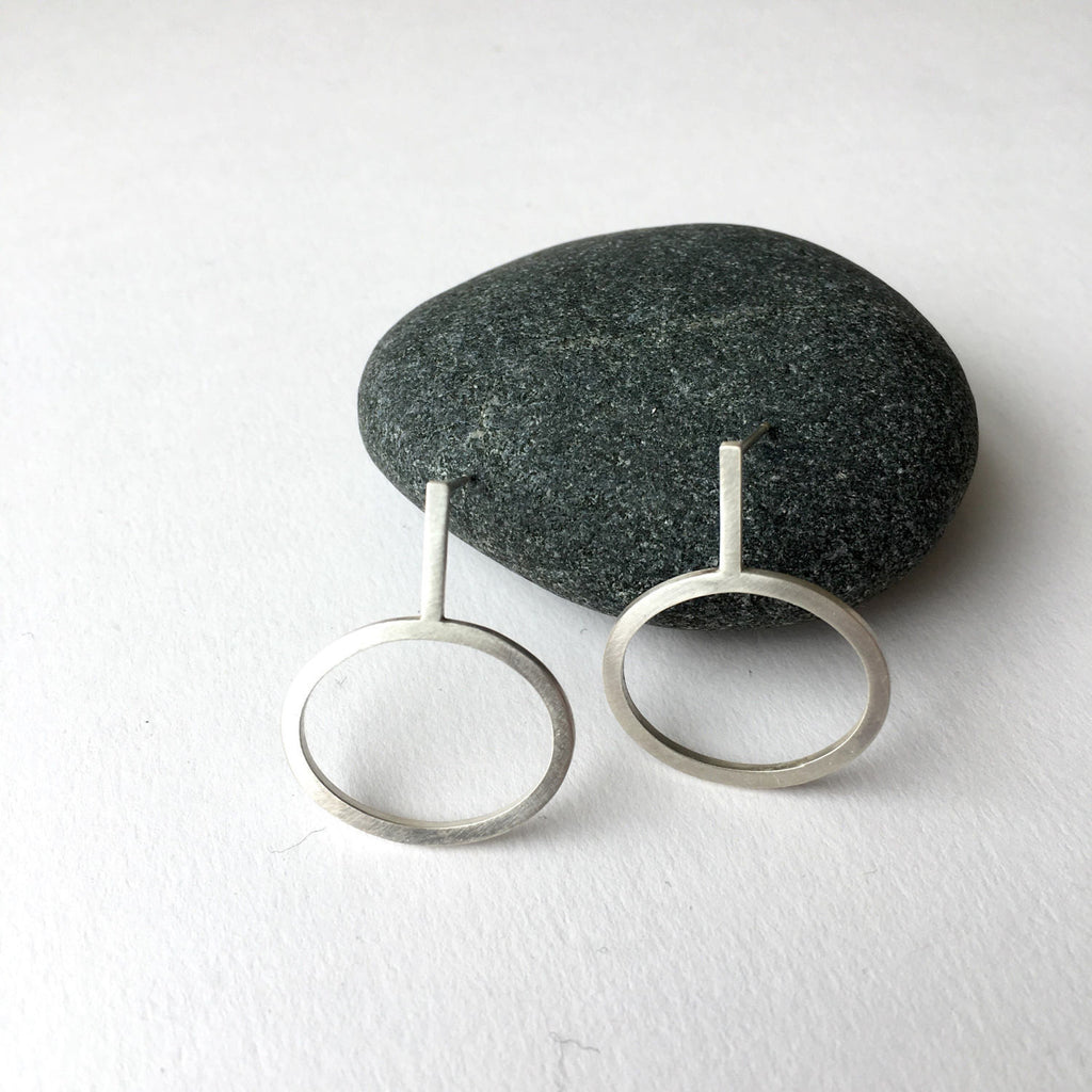 Oval dangle stud earrings available in matte or polished finish.