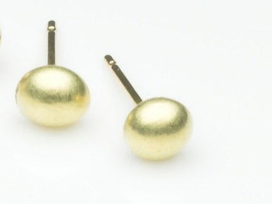 Minimalist 5 mm gold stud earrings.
