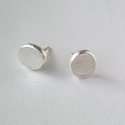 Rough textured hand made silver stud earrings on www.wyckoffsmith.com