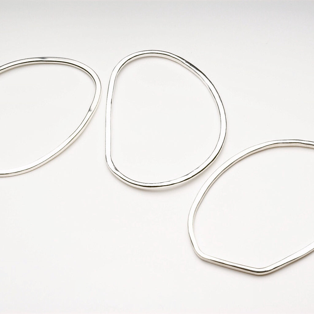 Trio of Oval Shaped Hammered Bangles
