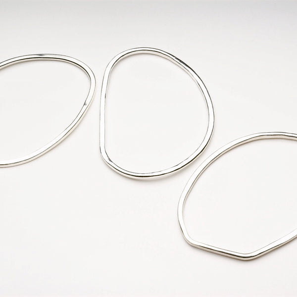 Trio of Oval Shaped Hammered Bangles