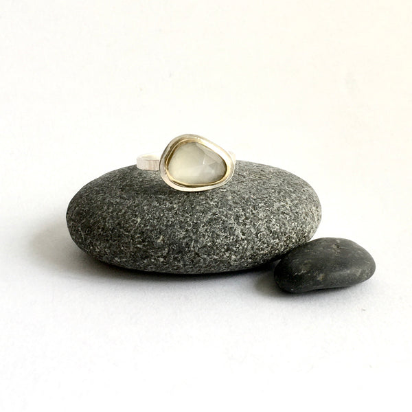 Front view of pale grey moonstone set in 18 ct gold on silver ring - www.wyckoffsmith.com