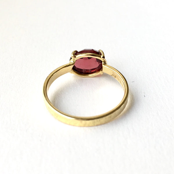 Wyckoff Smith Jewellery - back view of rose cut garnet ring in prong setting with textured ring shank.