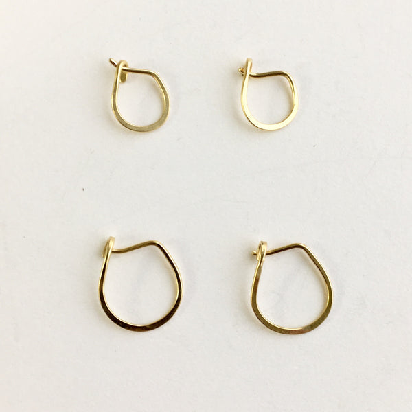 18 ct yellow gold hammered hoops by Wyckoff Smith Jewellery