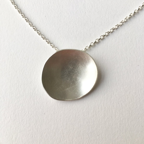 Horizontal concave oval pendant by Michele Wyckoff Smith
