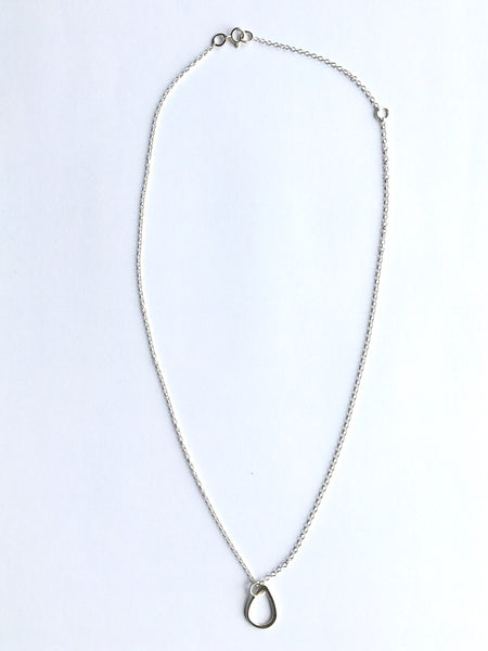Overview photograph of silver teardrop shape pendant on adjustable 16" or 18"  silver chain. www.wyckoffsmith.com 