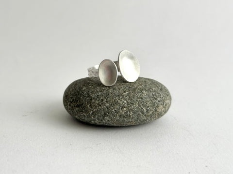 Open and adjustable silver ring on grey pebble - www.wyckoffsmith.com